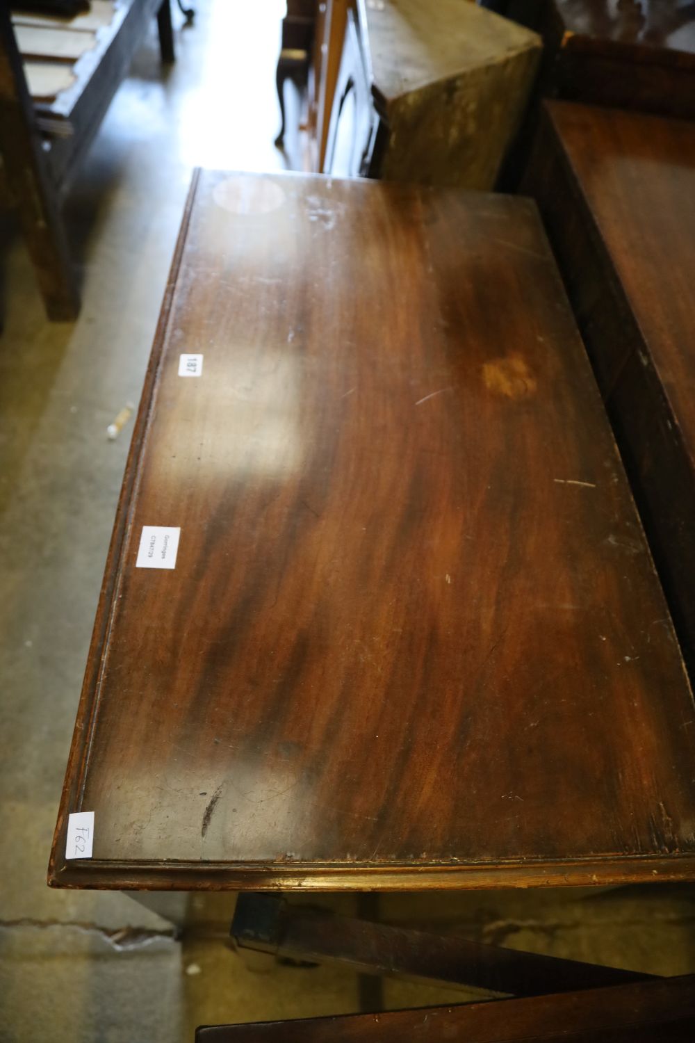A George III mahogany chest of drawers, with brushing slide, width 90cm depth 49cm height 84cm